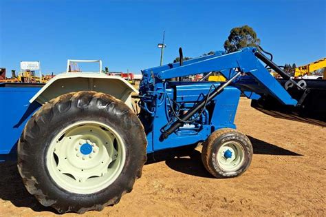 View Item in Catalog Lot 2928 (Sale Order 497 of 616). . Ford 4000 front end loader